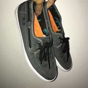 Gray vans in good condition and comfortable.